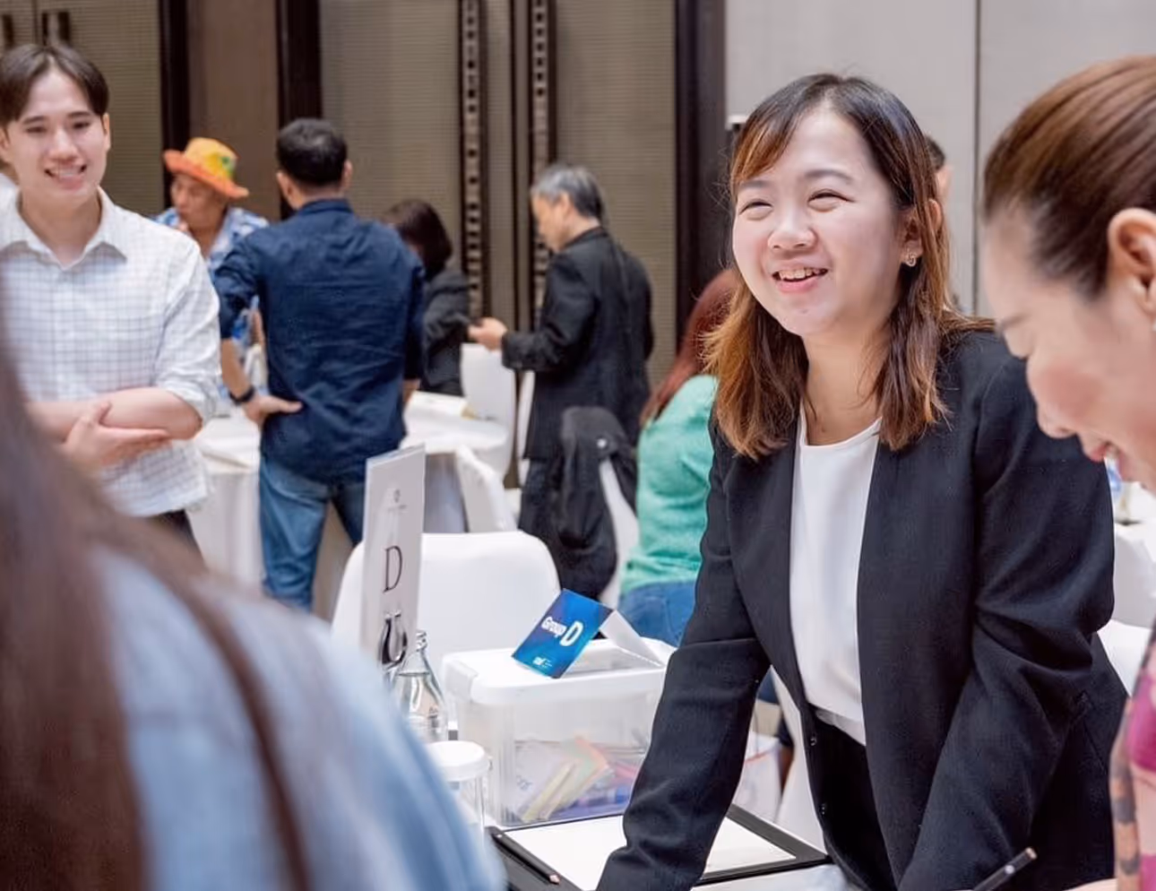 Participant building an AI assistant on a laptop